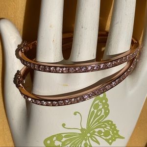 Rose gold bangle bracelets w sparkling CZs.